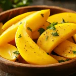 A vibrant bunch of banana peppers, showcasing their bright yellow color.