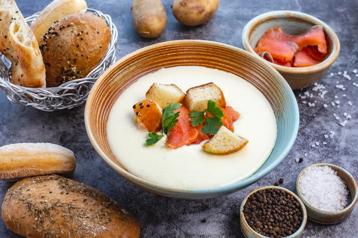 Delicious creamy potato and hamburger soup topped with fresh parsley.