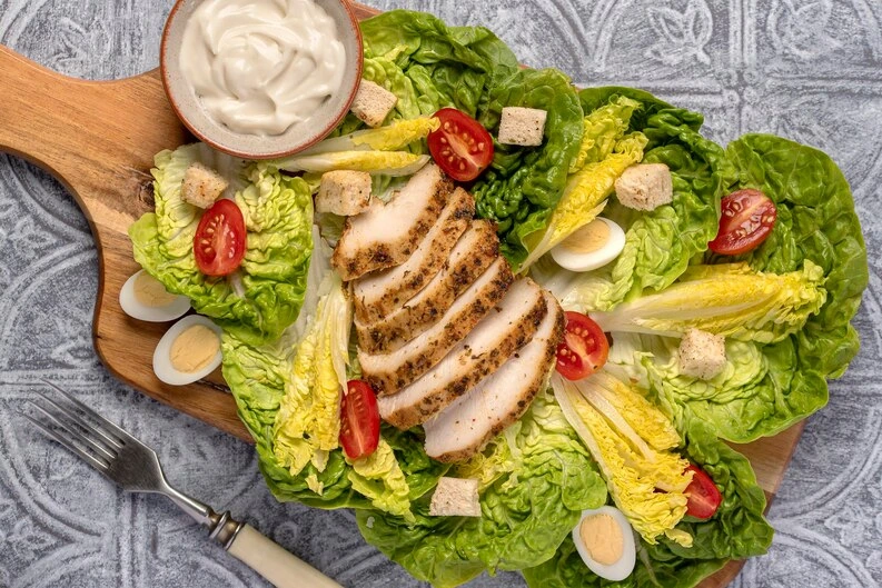 Fresh and flavorful Southwest Chicken Salad topped with cilantro, black beans, and a tangy dressing.