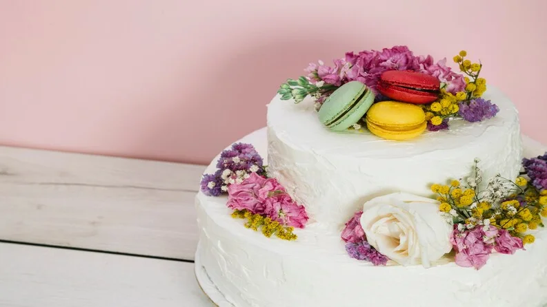 Flower and birthday cake featuring a floral design and a custom cake for a special celebration.