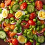 Vibrant Edamame Egg Salad with fresh vegetables and a light dressing.